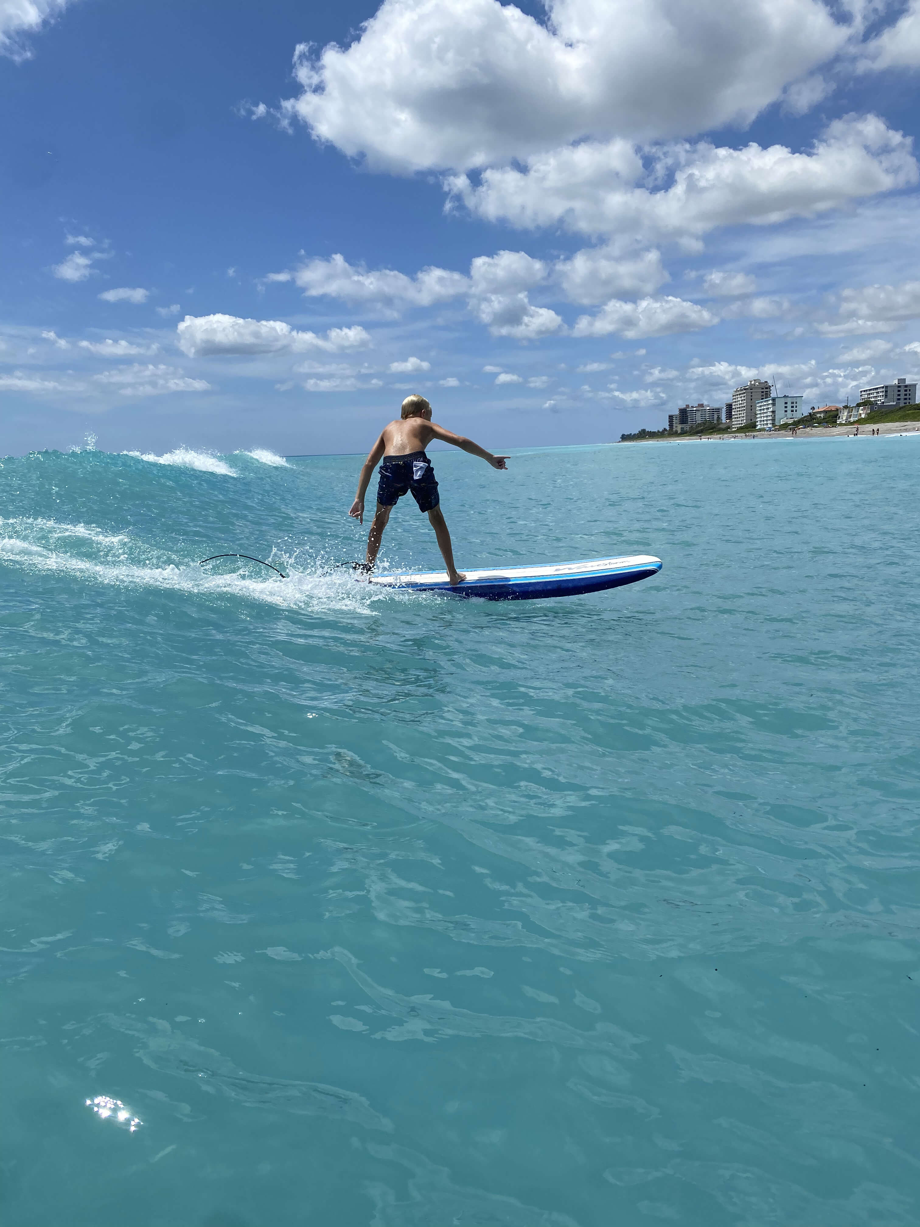 Kids surfing during the 2022 camp season